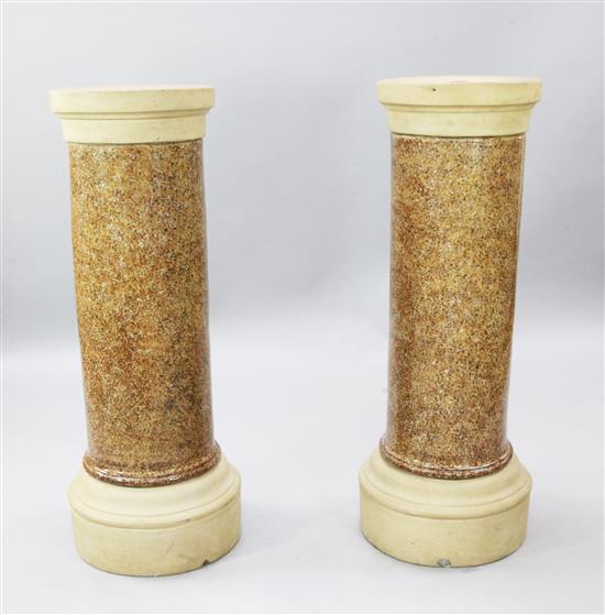 A pair of Lipscombes patent glazed terracotta pedestals, H.3ft 6in. Diam.1ft 2in.